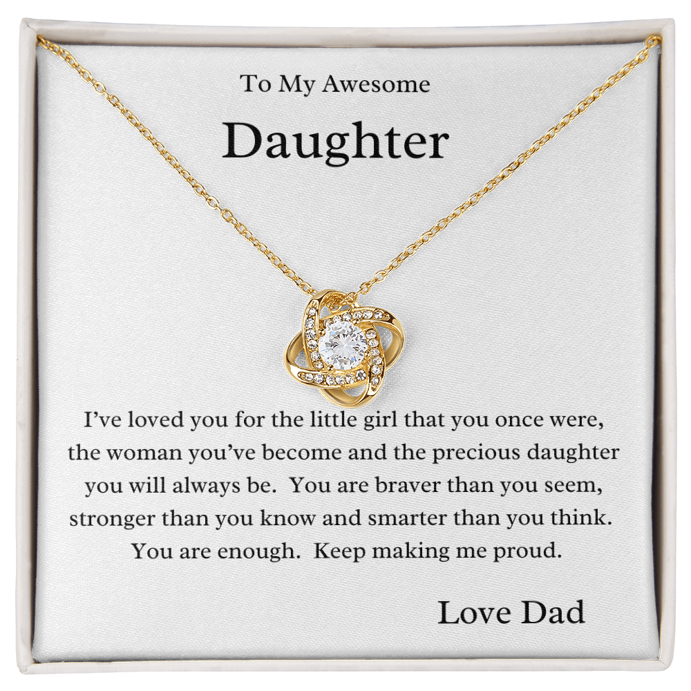 A necklace with a cubic zirconia pendant, presented in a box with a message to an daughter, expressing love and pride from dad.